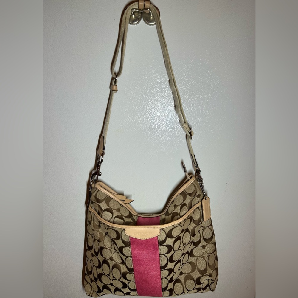 Pink Signature Canvas Coach Crossbody

L: 13in
H: 10in
W: 2in
